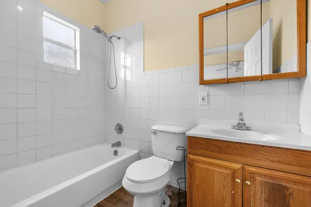 a bathroom with a sink toilet and bathtub