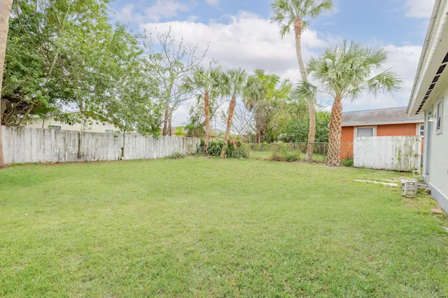 a view of a backyard with a garden