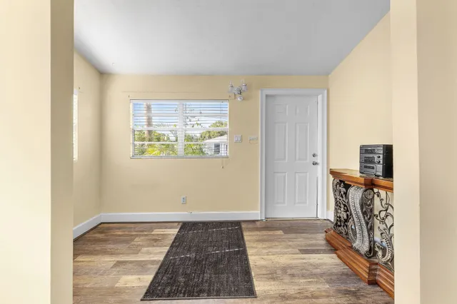 a view of livingroom with hardwood and hallway