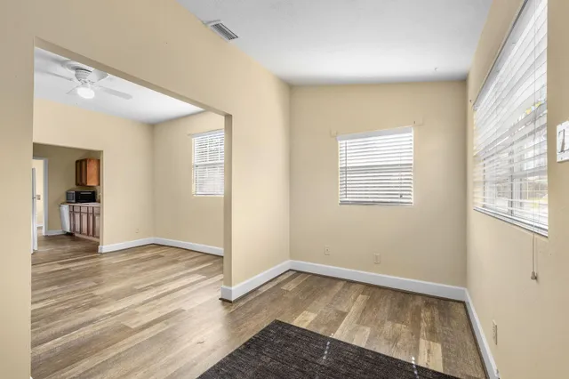 a view of an empty room and window