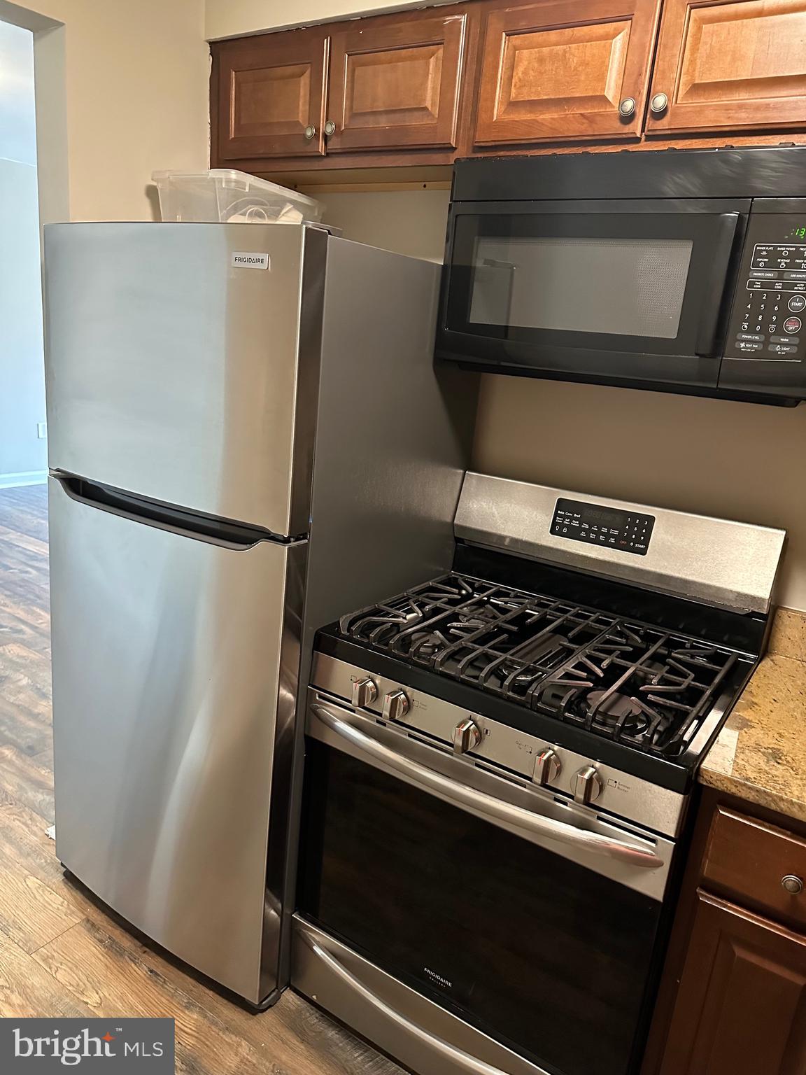 1805 Addison Road South District Heights, MD 20747 - Photo 8 of 28 a close view of a stove top oven and refrigerator
