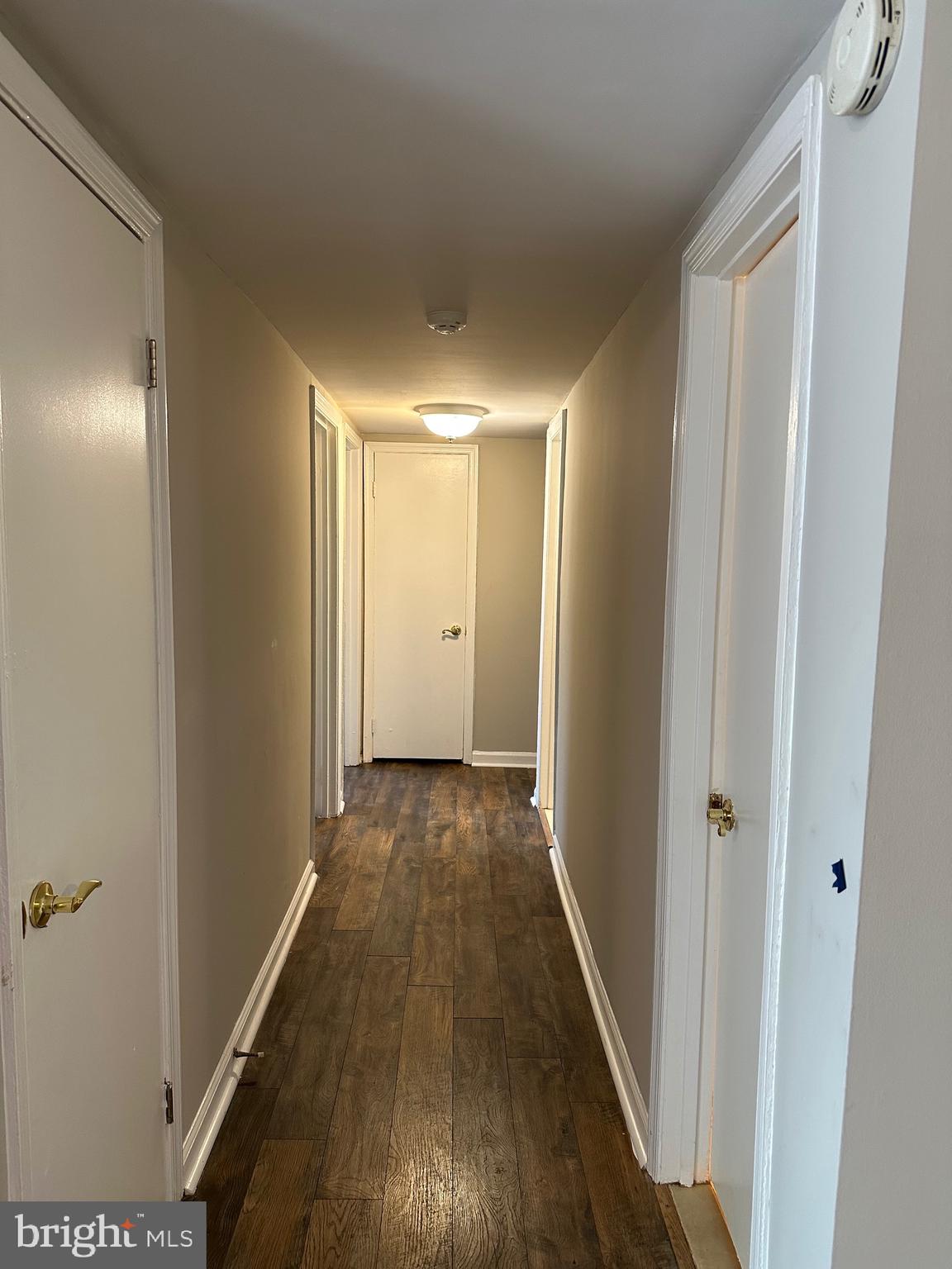 1805 Addison Road South District Heights, MD 20747 - Photo 10 of 28 a view of a hallway with wooden floor