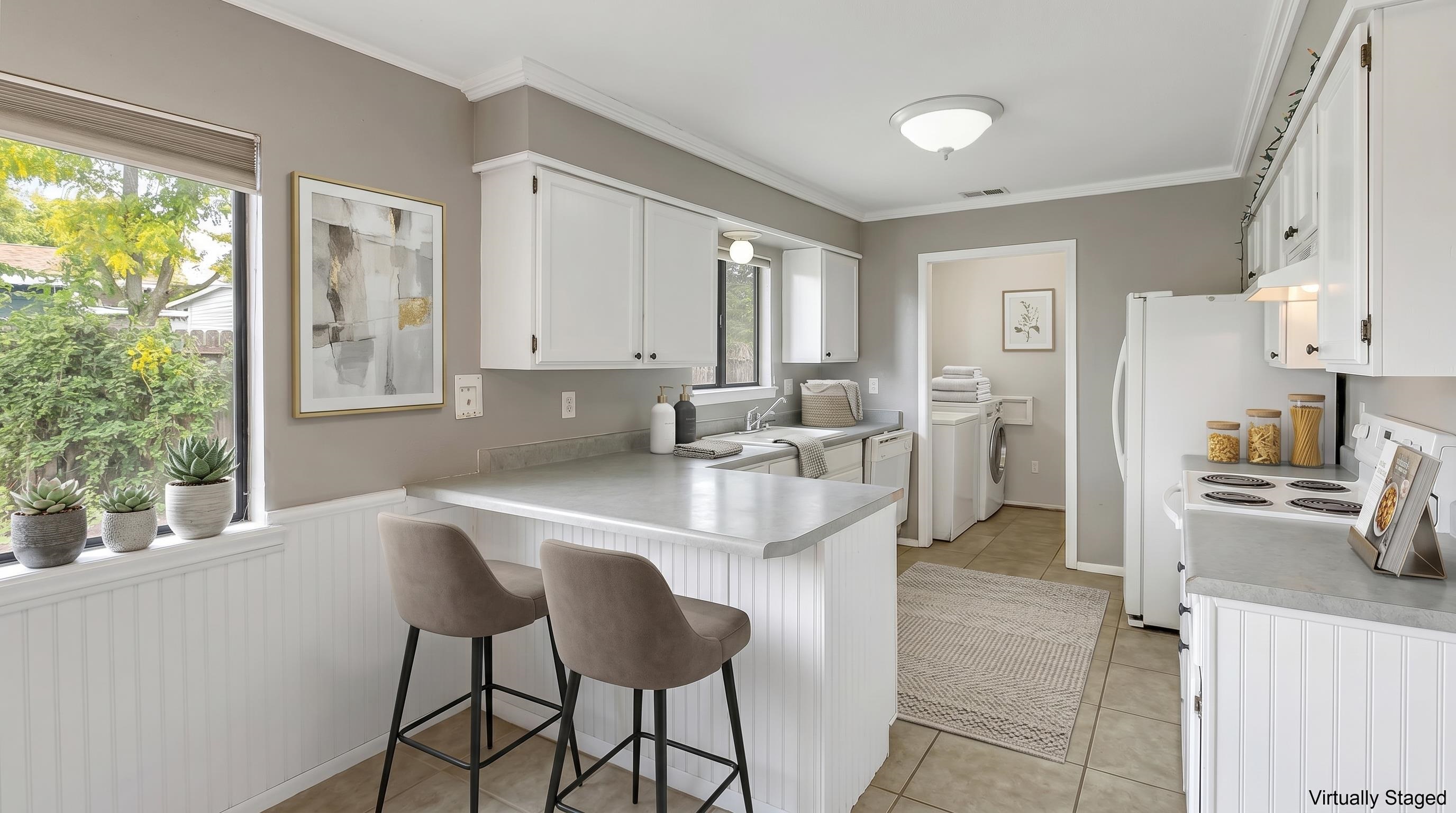 483-30 C 3/4 Road Grand Junction, CO 81504 - Photo 4 of 25 a kitchen with stainless steel appliances granite countertop a sink and a refrigerator