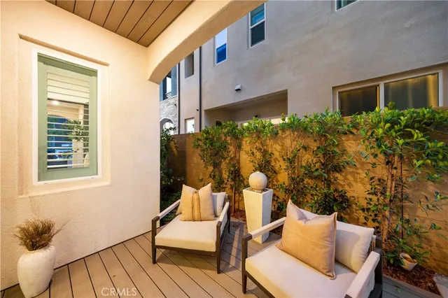 an aerial view of residential building and ocean