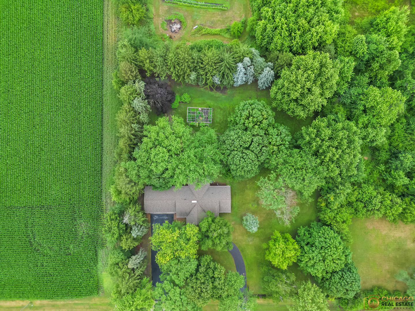 8019 South Malta Road DeKalb, IL 60115 - Photo 4 of 51 a view of a garden