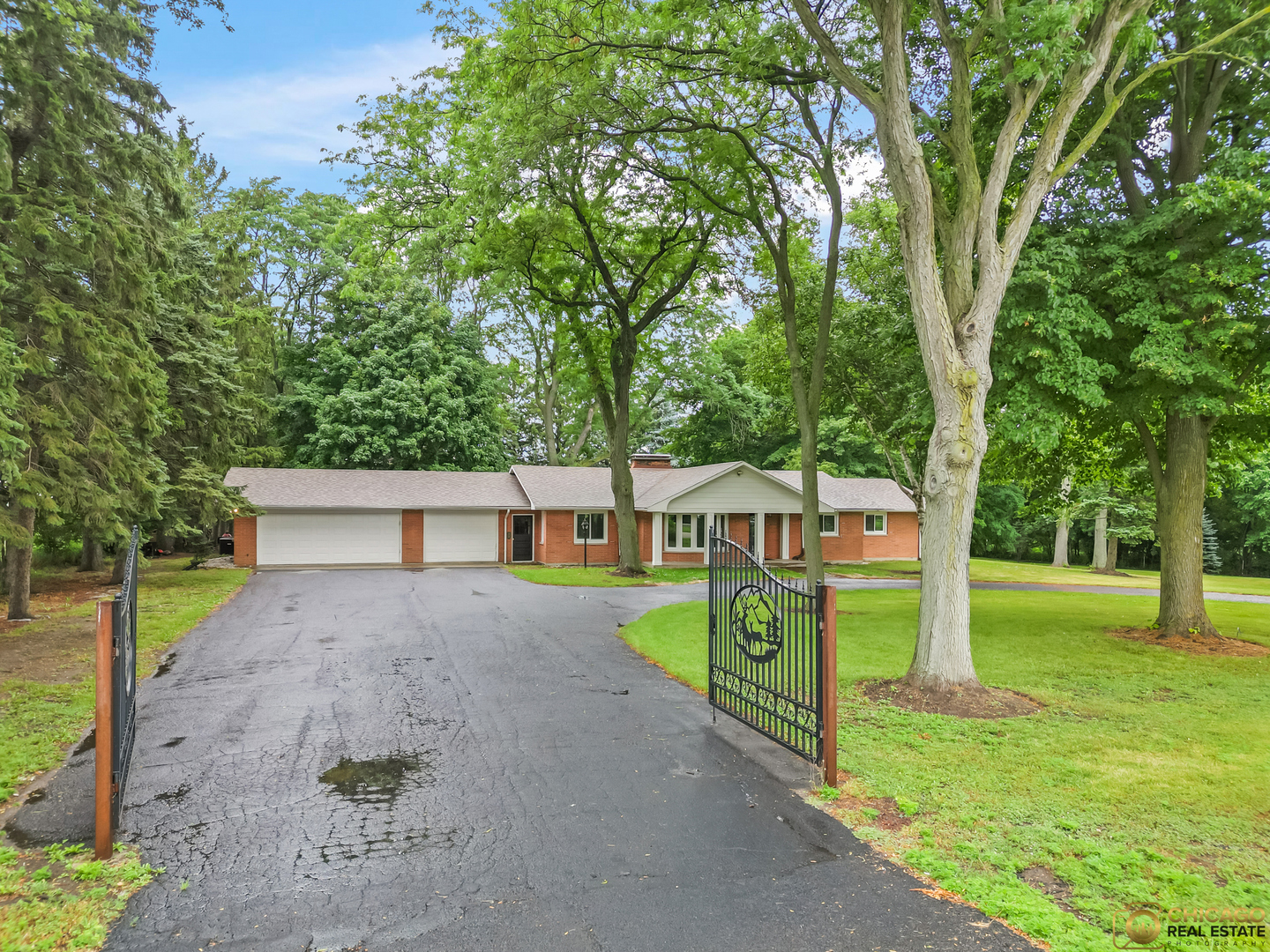 8019 South Malta Road DeKalb, IL 60115 - Photo 5 of 51 a view of a house with a yard and garage