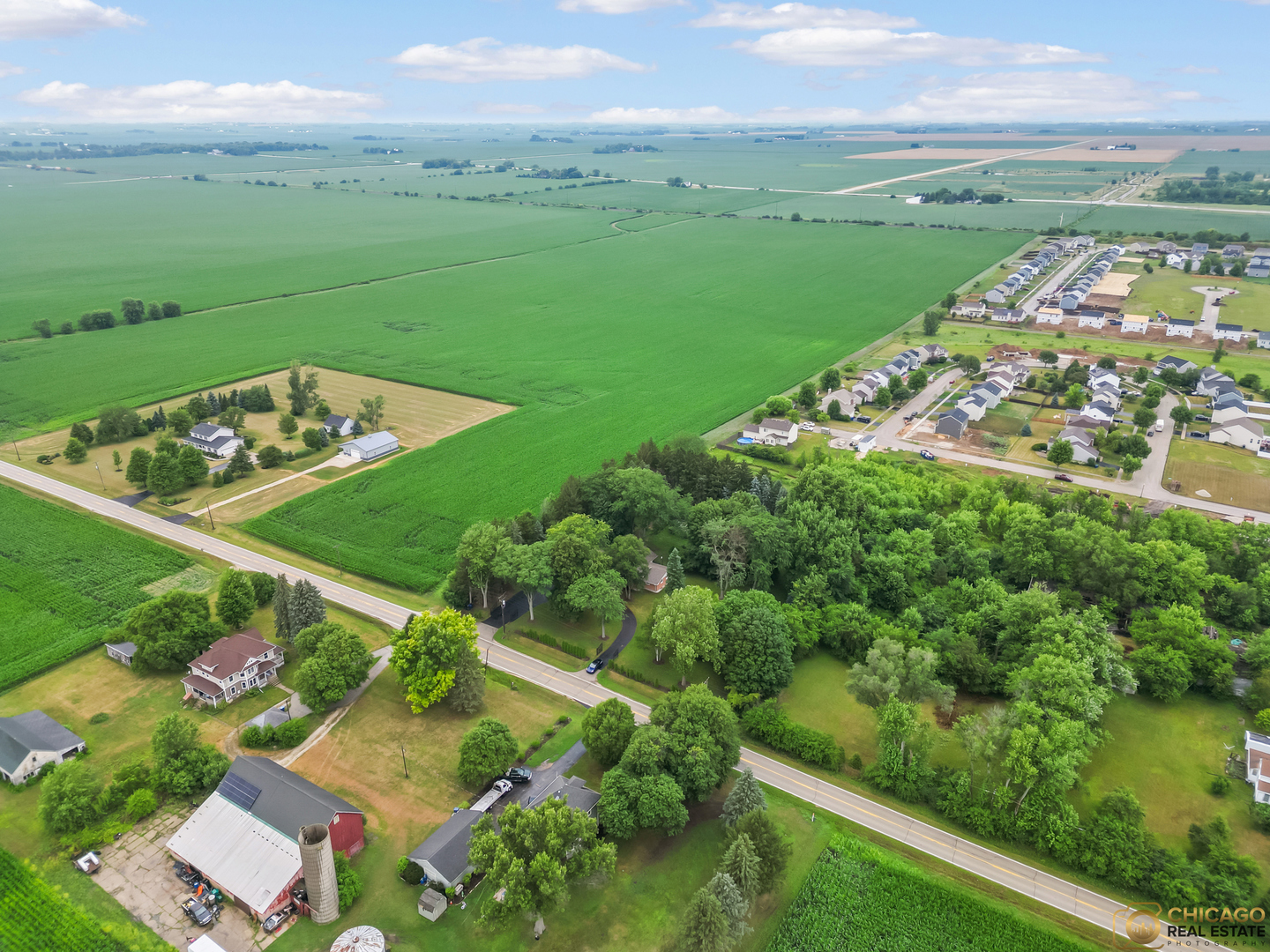 8019 South Malta Road DeKalb, IL 60115 - Photo 51 of 51 a view of a city with lush green forest
