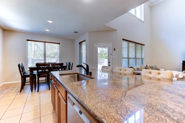 a very nice looking living room with a large window