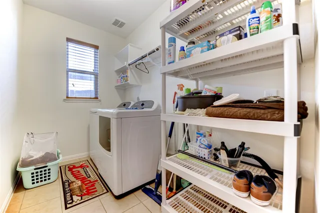 a storage room with washer and dryer