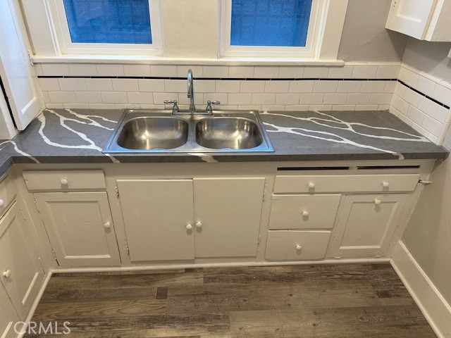 1025 Locust Avenue Long Beach, CA 90813 - Photo 16 of 64 a kitchen with a sink and cabinets