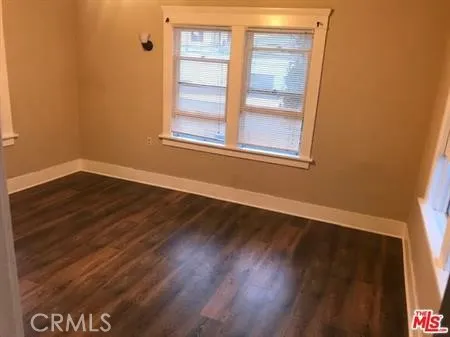 a kitchen with stainless steel appliances granite countertop a stove and a refrigerator