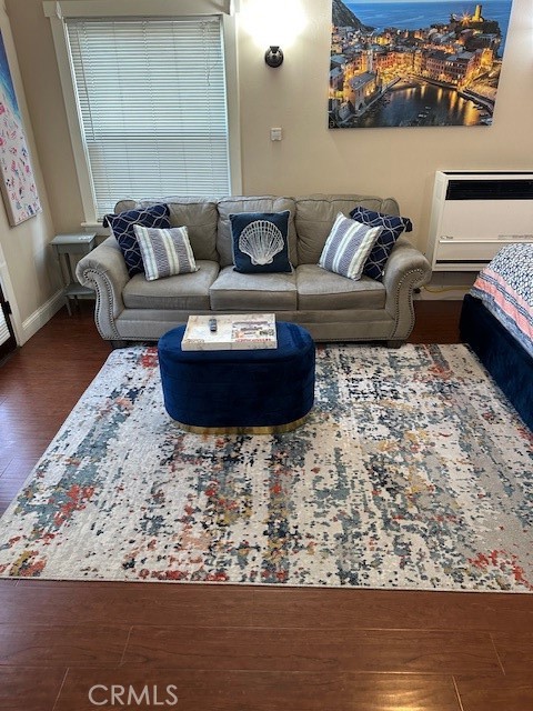 1025 Locust Avenue Long Beach, CA 90813 - Photo 34 of 64 a living room with furniture and a wooden floor