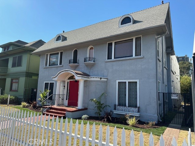 1025 Locust Avenue Long Beach, CA 90813 - Photo 4 of 64 a front view of a house with garden