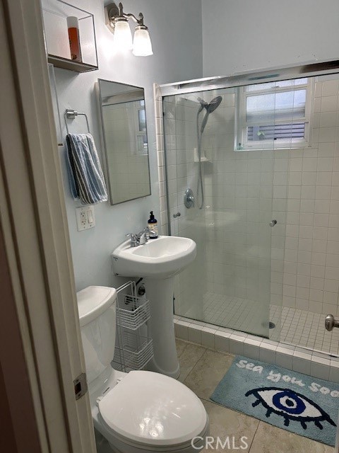 1025 Locust Avenue Long Beach, CA 90813 - Photo 43 of 64 a bathroom with a sink toilet and shower