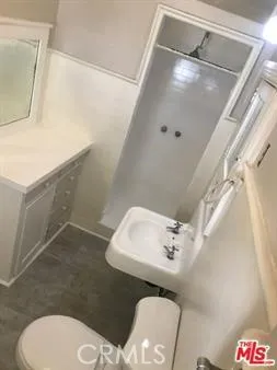 a view of hallway with wooden floor