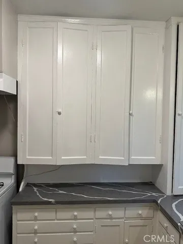 a view of balcony with wooden floor