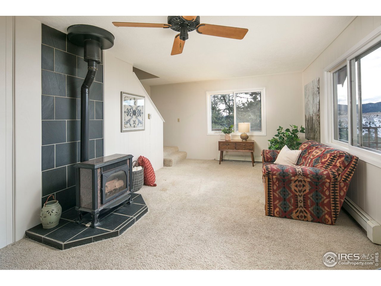 353 Mountain Meadows Road Boulder, CO 80302 - Photo 8 of 40 Living room looking to stairs to top floor bedrooms