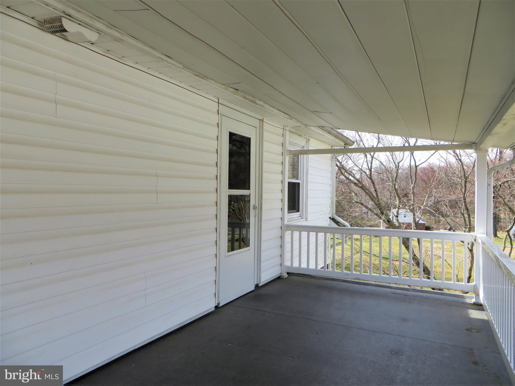 1215 Swamp Bridge Road Denver, PA 17517 - Photo 6 of 23 Covered Balcony with Rubber