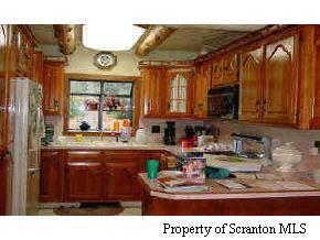 Bowen Road Moscow, PA 18444 - Photo 3 of 3 a kitchen with a refrigerator and a sink