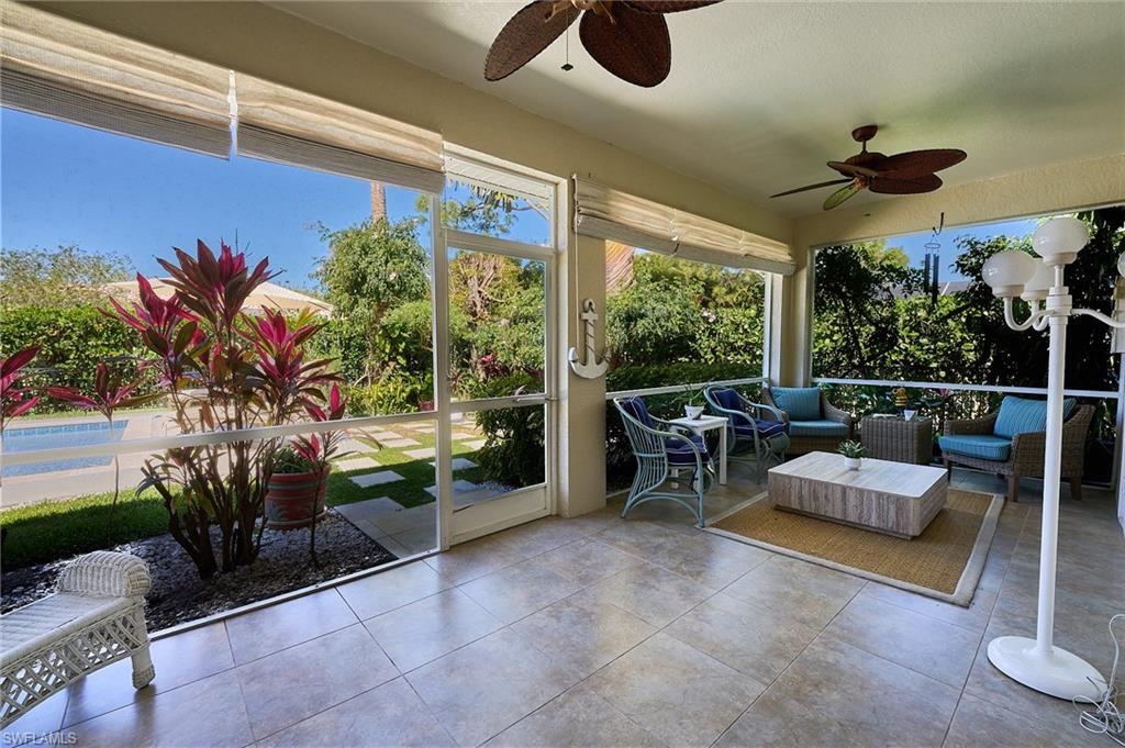 186 Muirfield Circle Naples, FL 34113 - Photo 15 of 36 a outdoor space with furniture