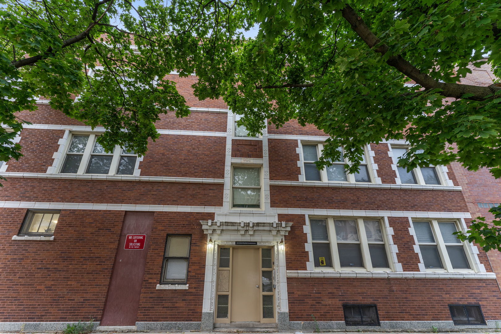 12 North Mayfield Avenue, Unit 3N Chicago, IL 60644 - Photo 1 of 8 front view of a building