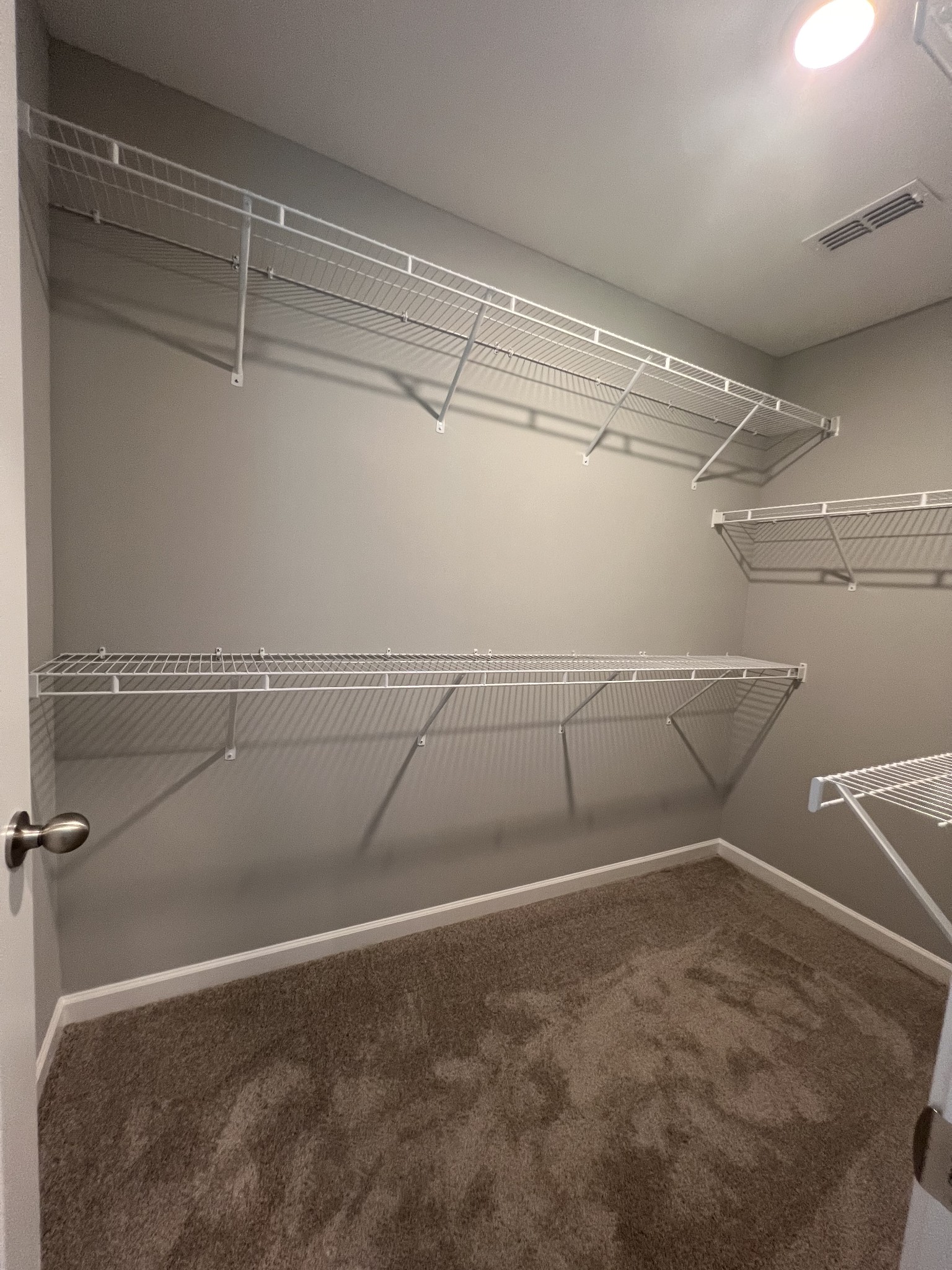 5727 Dockside Rockvale, TN 37153 - Photo 11 of 19 a view of a room with racks on the wall