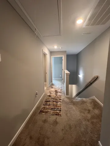 a view of a room with natural light