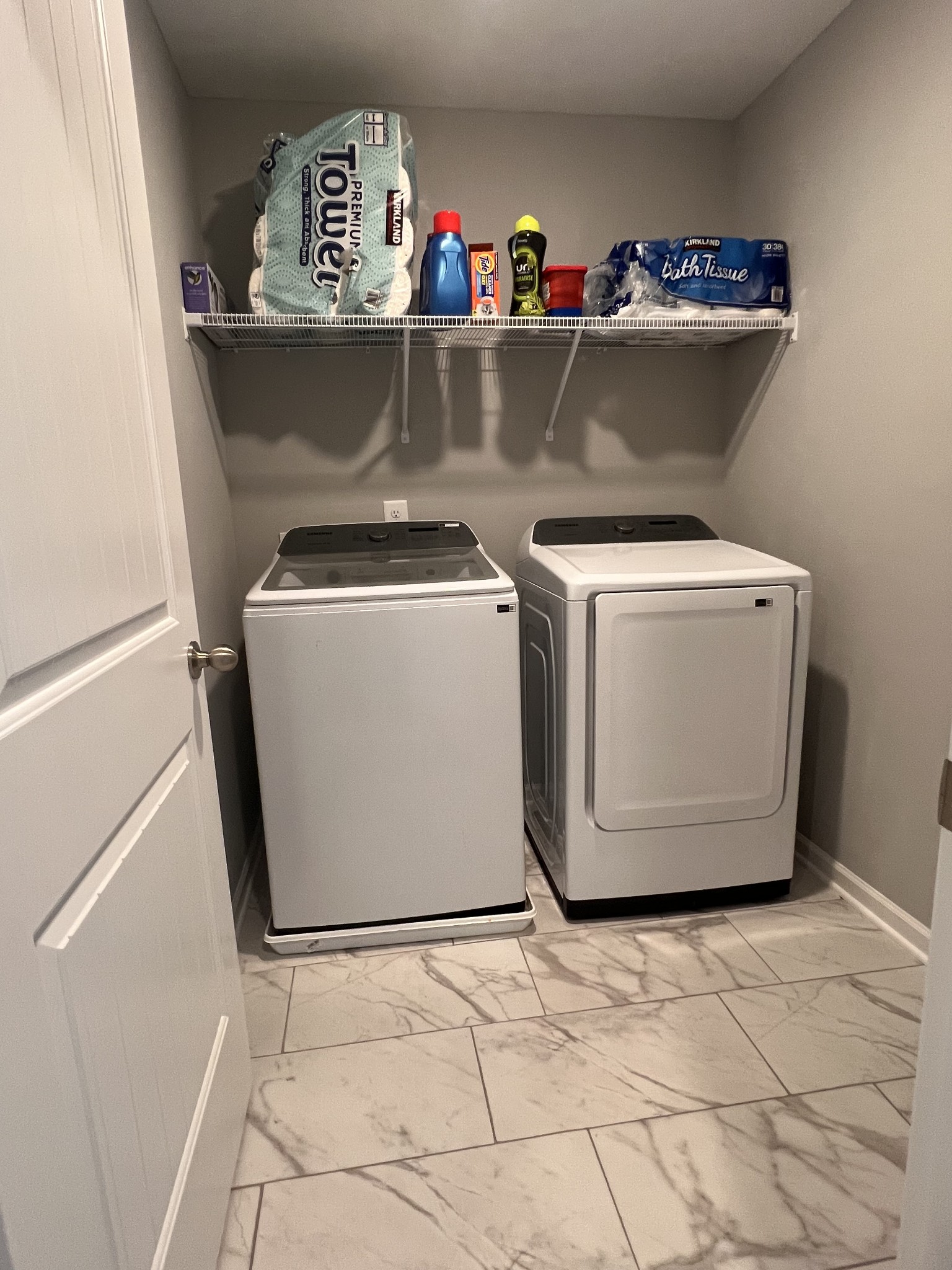 5727 Dockside Rockvale, TN 37153 - Photo 13 of 19 a view of washer and dryer with kitchen in the background