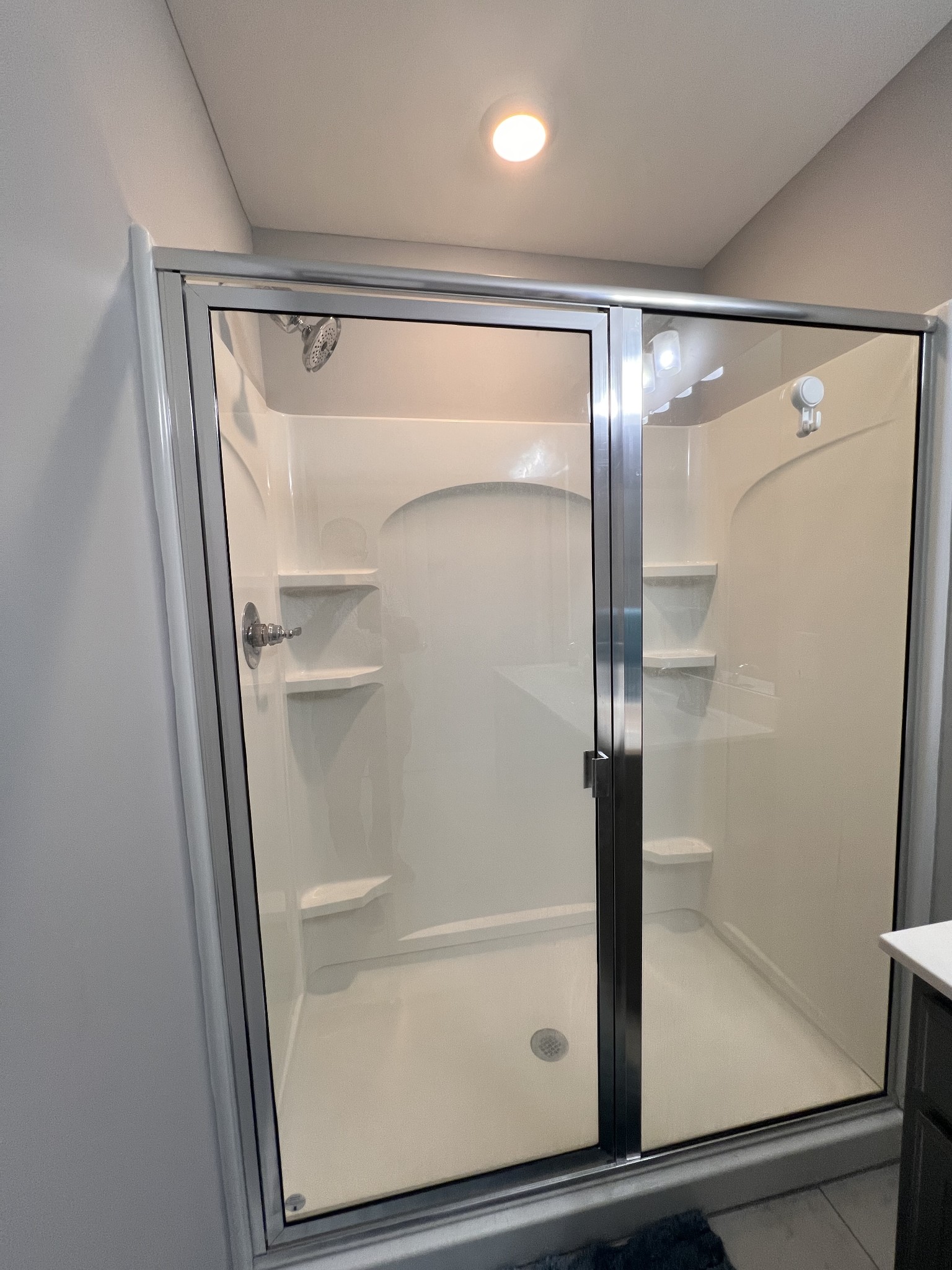 5727 Dockside Rockvale, TN 37153 - Photo 19 of 19 a bathroom with a glass shower door