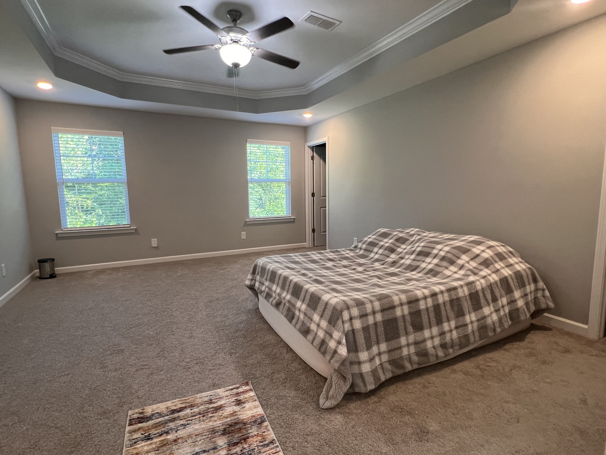 5727 Dockside Rockvale, TN 37153 - Photo 8 of 19 a spacious bedroom with a bed and a chandelier