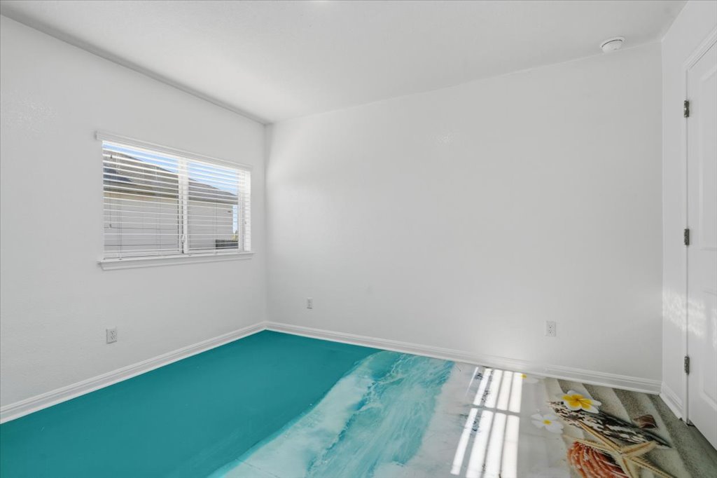 19040 Kimberlite Drive Pflugerville, TX 78660 - Photo 35 of 40 Empty room featuring baseboards