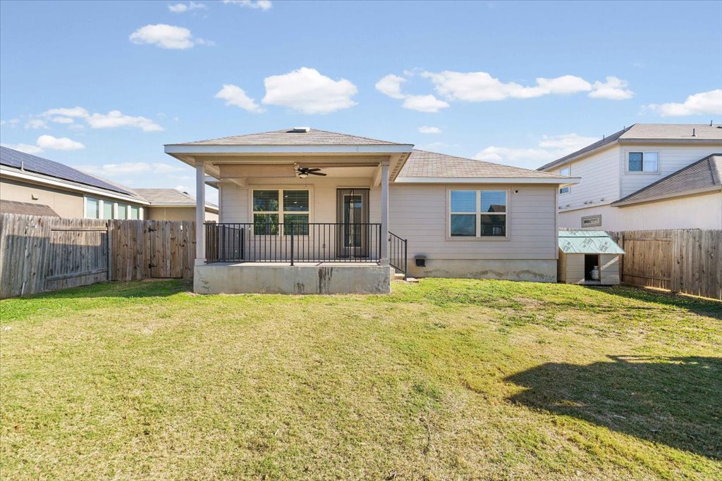 19040 Kimberlite Drive Pflugerville, TX 78660 - Photo 38 of 40 Back of house featuring a fenced backyard, a ceiling fan, and covered porch