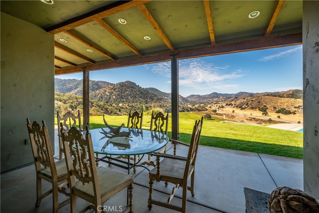 8680 Alamo Creek Road Santa Maria, CA 93454 - Photo 11 of 74 a view of a chairs and table in the patio