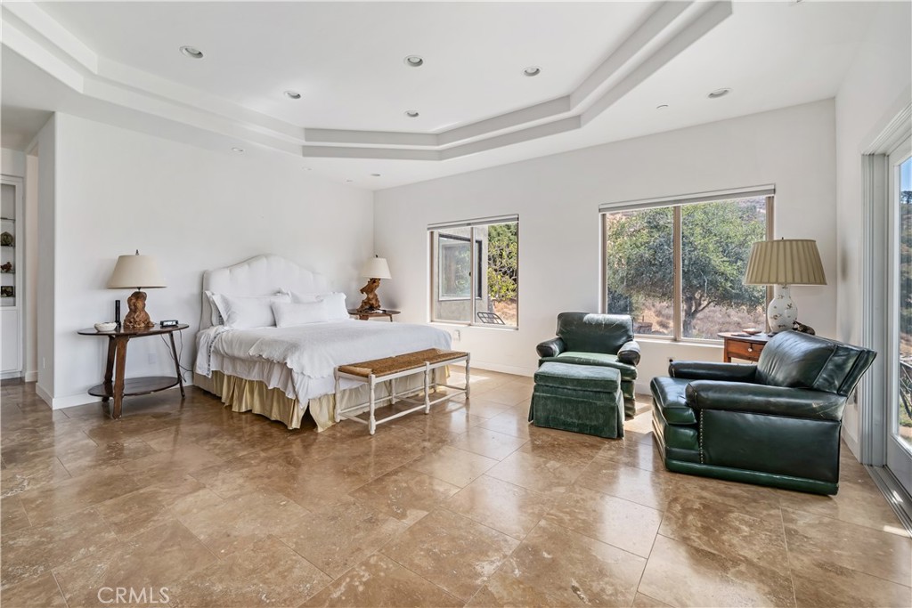 8680 Alamo Creek Road Santa Maria, CA 93454 - Photo 21 of 74 a bedroom with a bed and a couch
