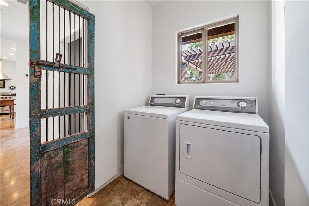 8680 Alamo Creek Road Santa Maria, CA 93454 - Photo 31 of 74 a utility room with dryer and washer