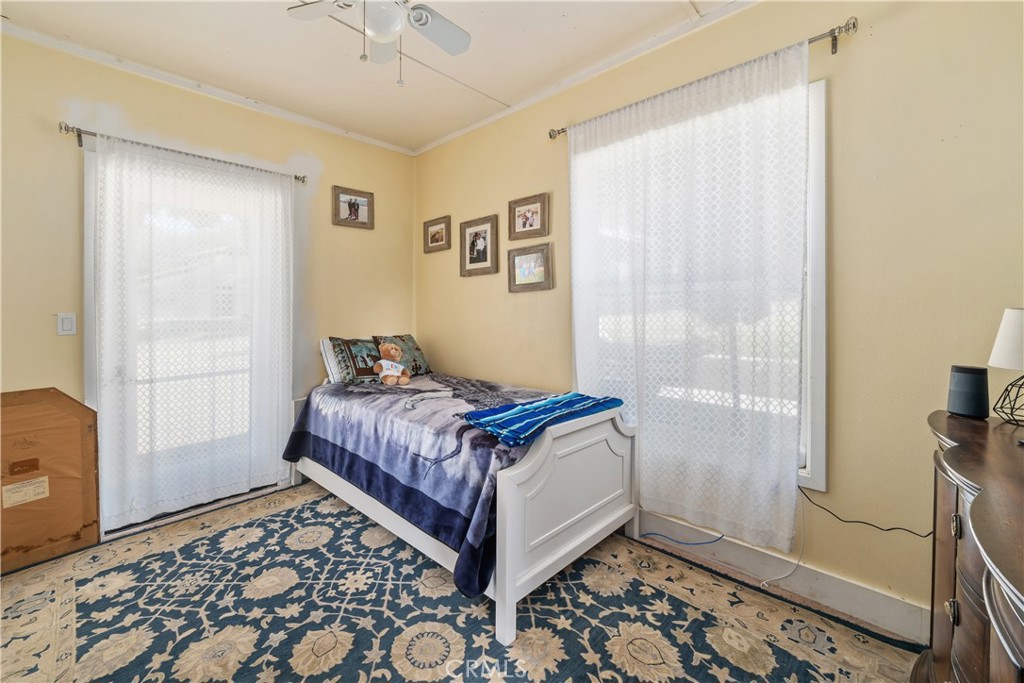 8680 Alamo Creek Road Santa Maria, CA 93454 - Photo 56 of 74 a bedroom with a bed and a window