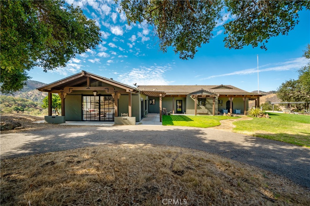 8680 Alamo Creek Road Santa Maria, CA 93454 - Photo 6 of 74 a view of a house with a yard and sitting area