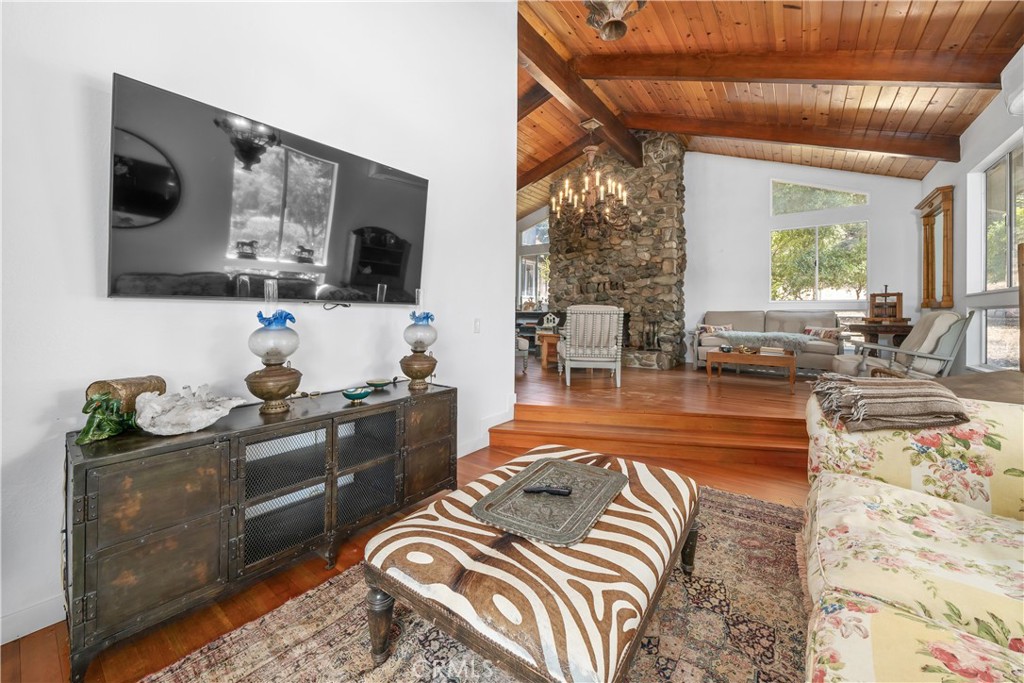 8680 Alamo Creek Road Santa Maria, CA 93454 - Photo 62 of 74 a living room with furniture and a flat screen tv