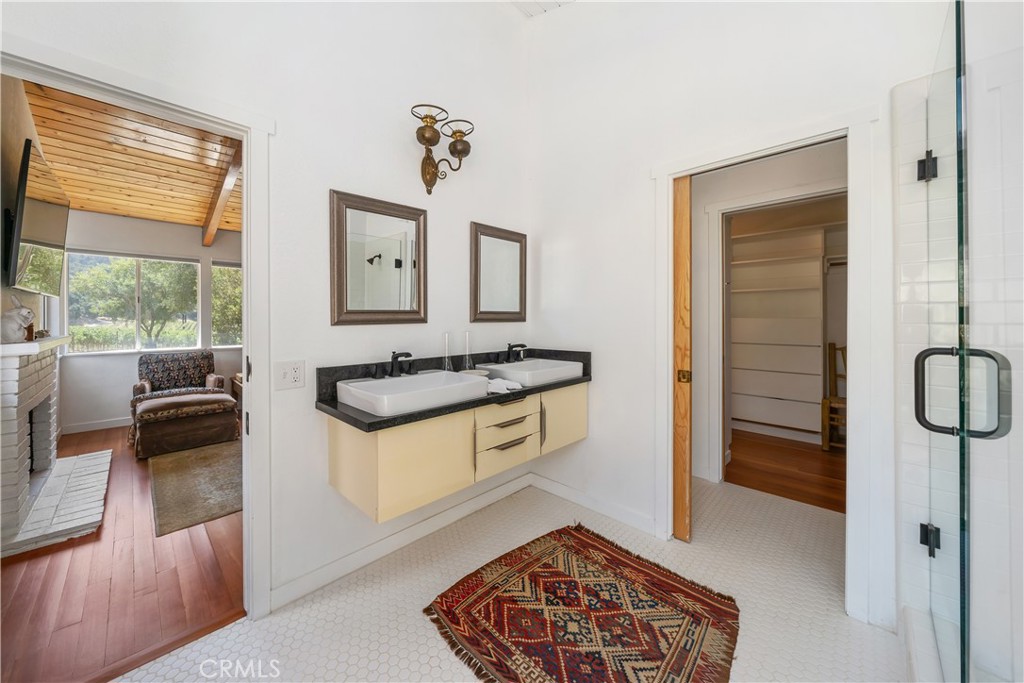 8680 Alamo Creek Road Santa Maria, CA 93454 - Photo 68 of 74 a kitchen with stainless steel appliances granite countertop a stove a sink and a refrigerator