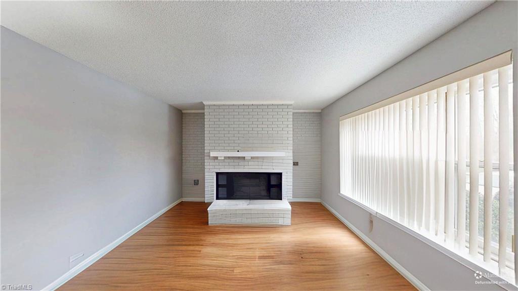 2701 North Centennial Street, Unit F High Point, NC 27265 - Photo 26 of 26 Living room photo showning unfurnished look