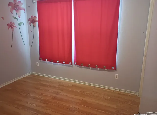 a bathroom with a toilet and a bathtub