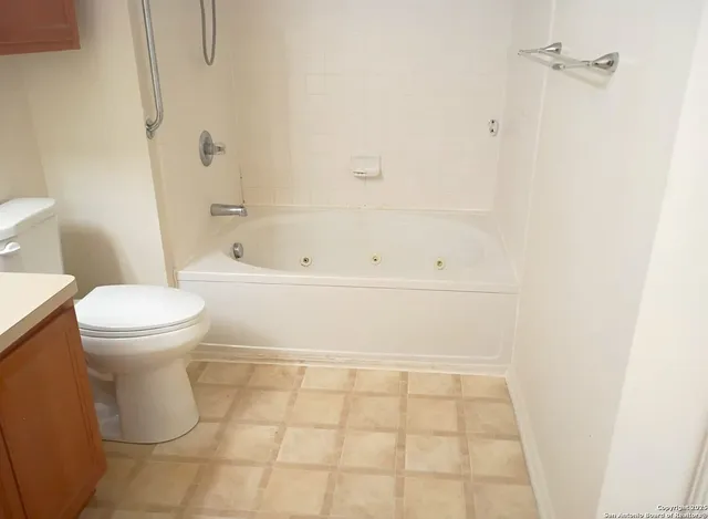 a bathroom with a sink and a toilet