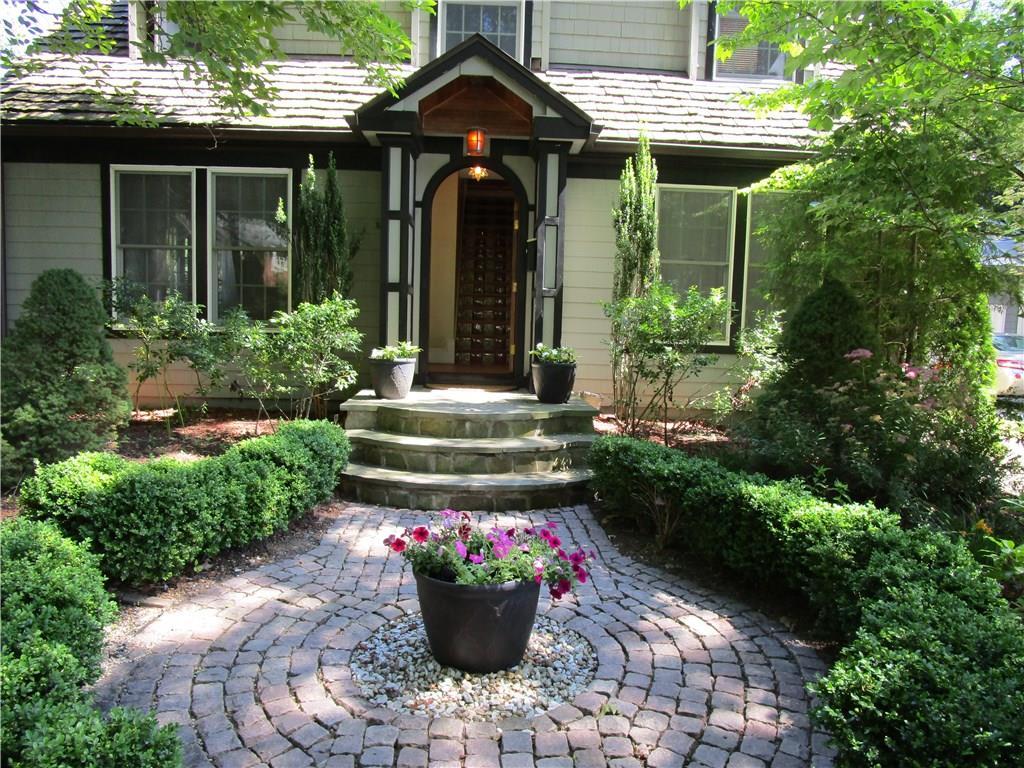 65 Laurel Road New Haven, CT 06515 - Photo 1 of 1 a front view of a house with a porch