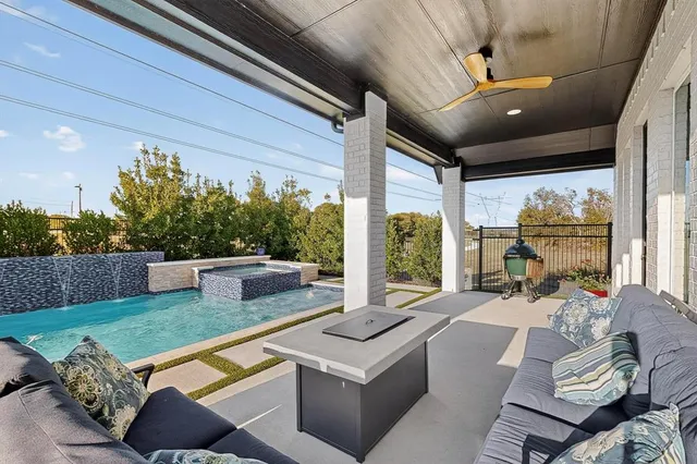 a outdoor living space with furniture and a garden