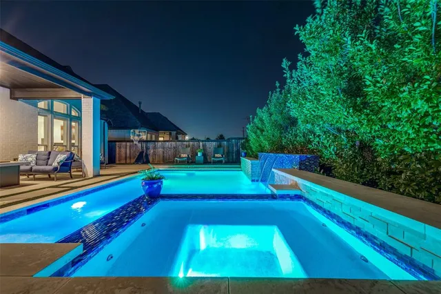 a view of an outdoor space with a swimming pool