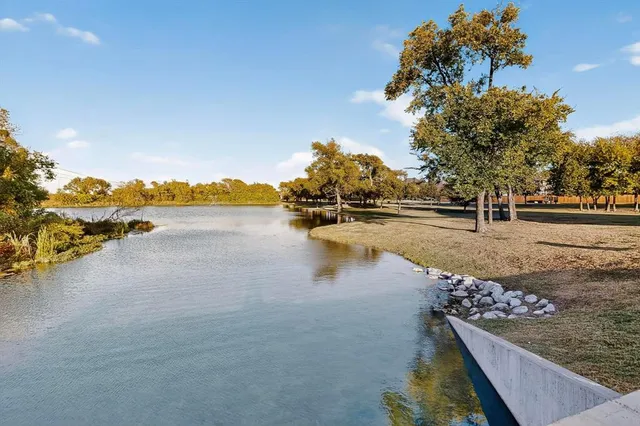 a view of a lake with houses