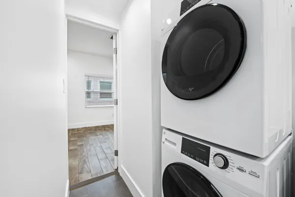 a utility room with dryer and washer