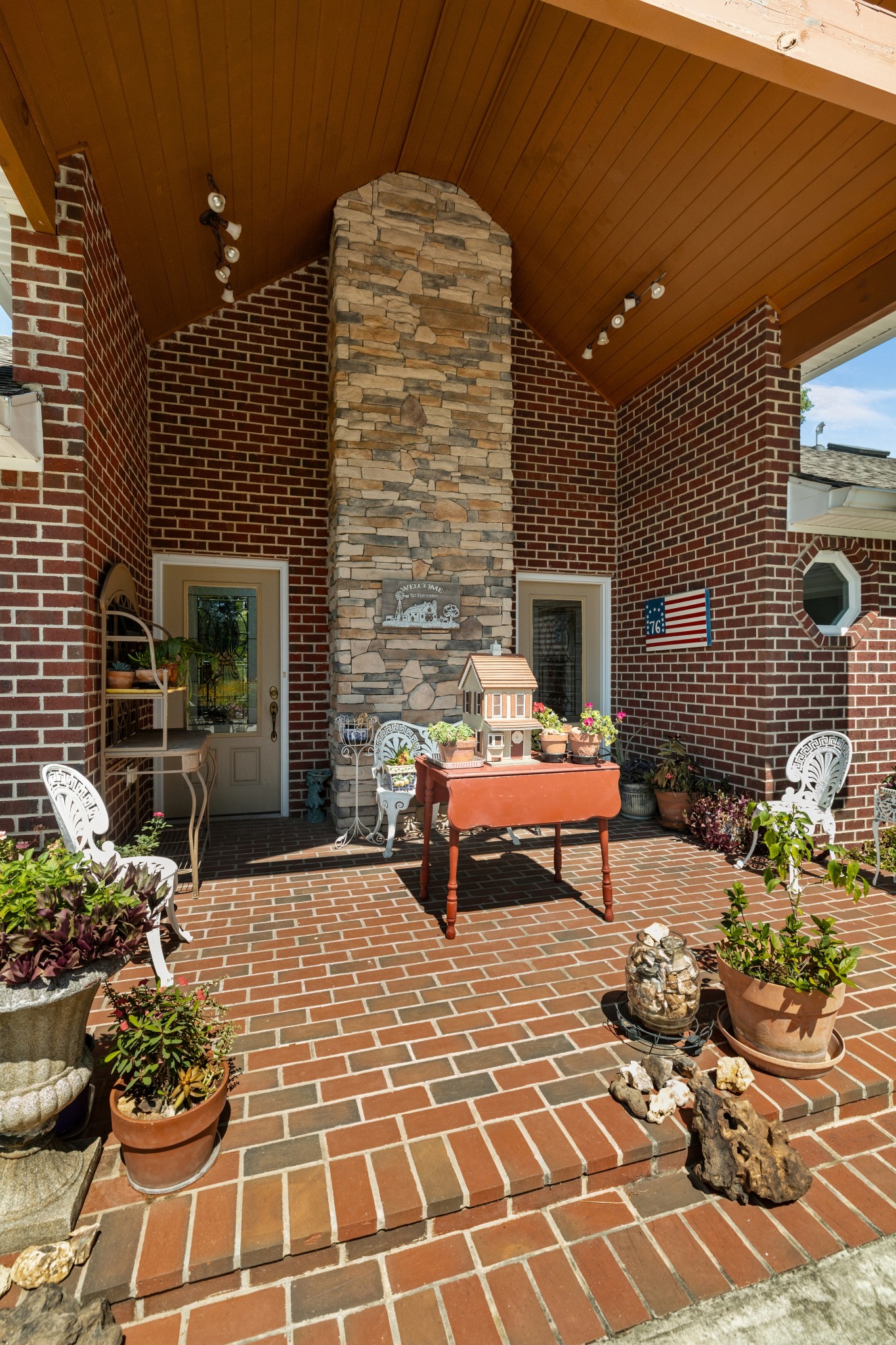 1556 Chestnut Grove Road Morrison, TN 37357 - Photo 31 of 58 a building outdoor space with patio furniture and potted plants