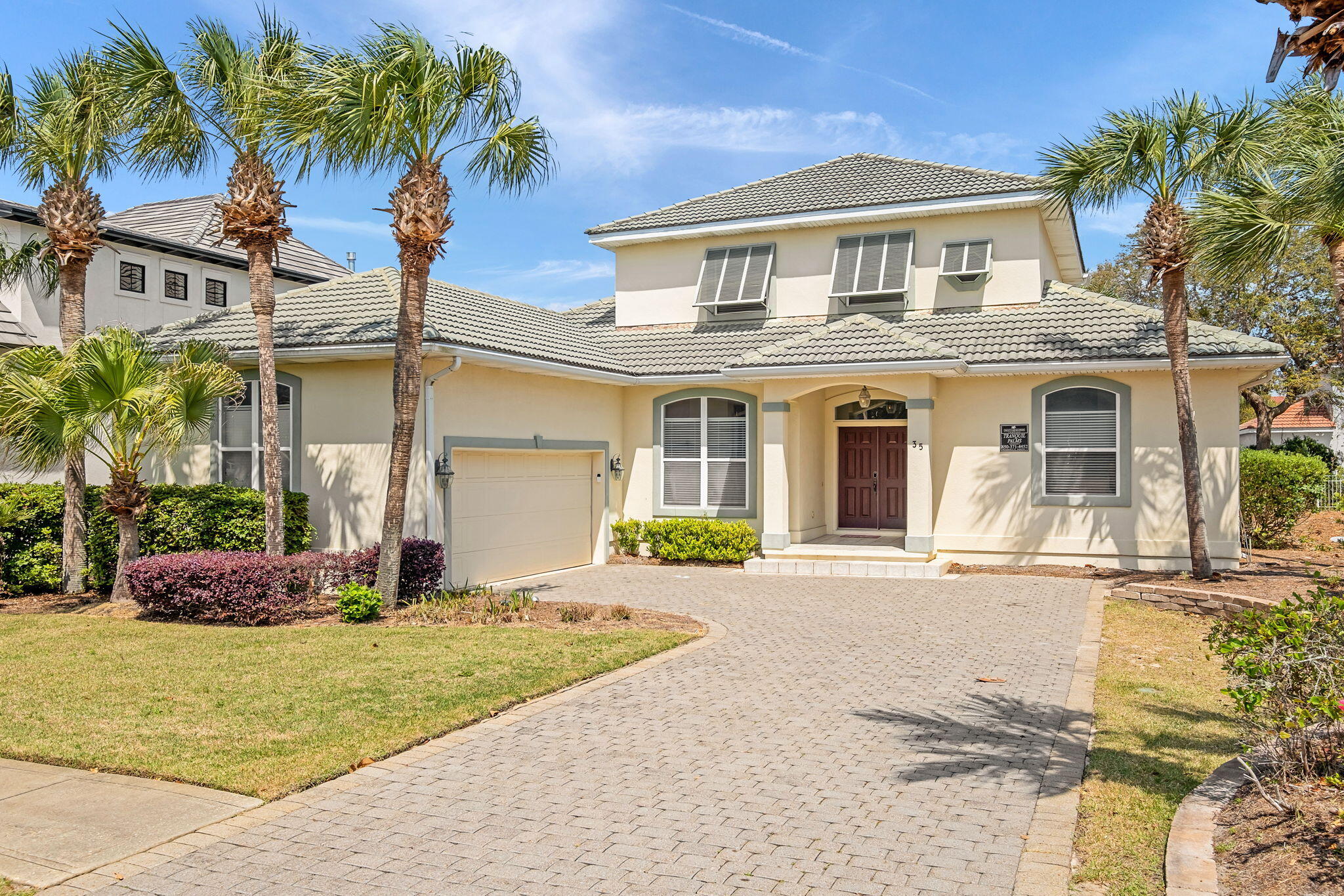 35 Tranquility Lane Destin, FL 32541 - Photo 2 of 19 front view of a house with a yard