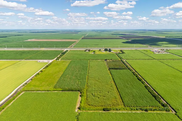 a view of an outdoor space and tennis court